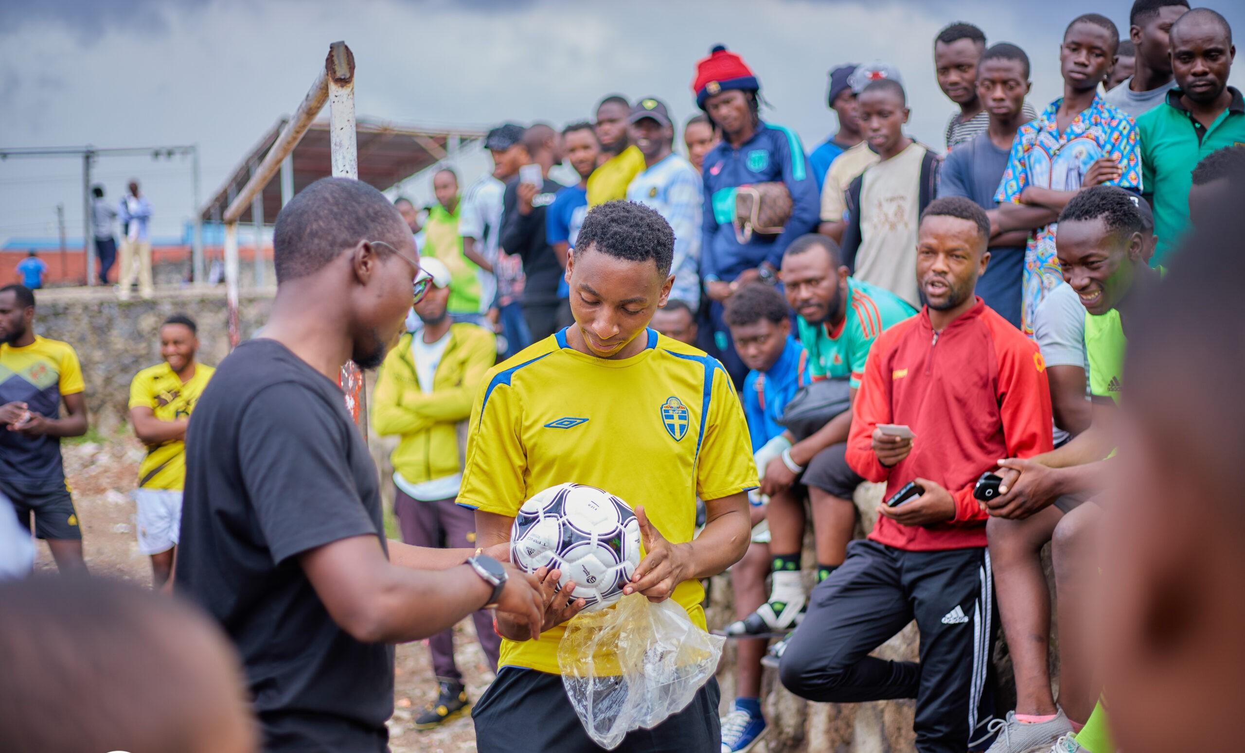 Espoir N 2 Espoir gifting a football